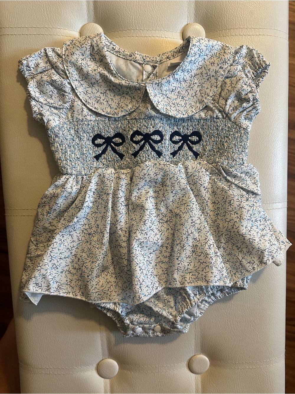 Blue Floral Smocked Baby Romper with Navy Bow Embroidery